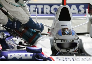 Nick Heidfeld makes a pit stop